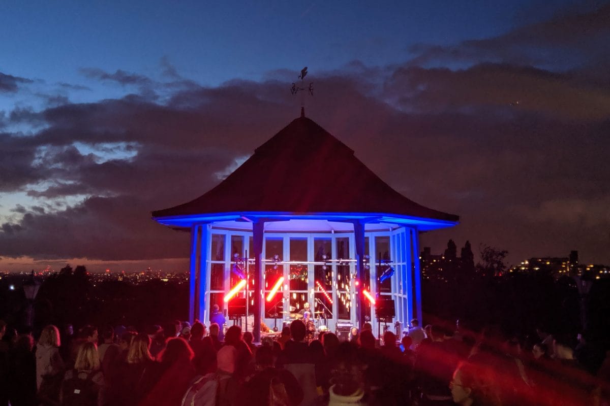 The Bandstand lit up at night for a concert