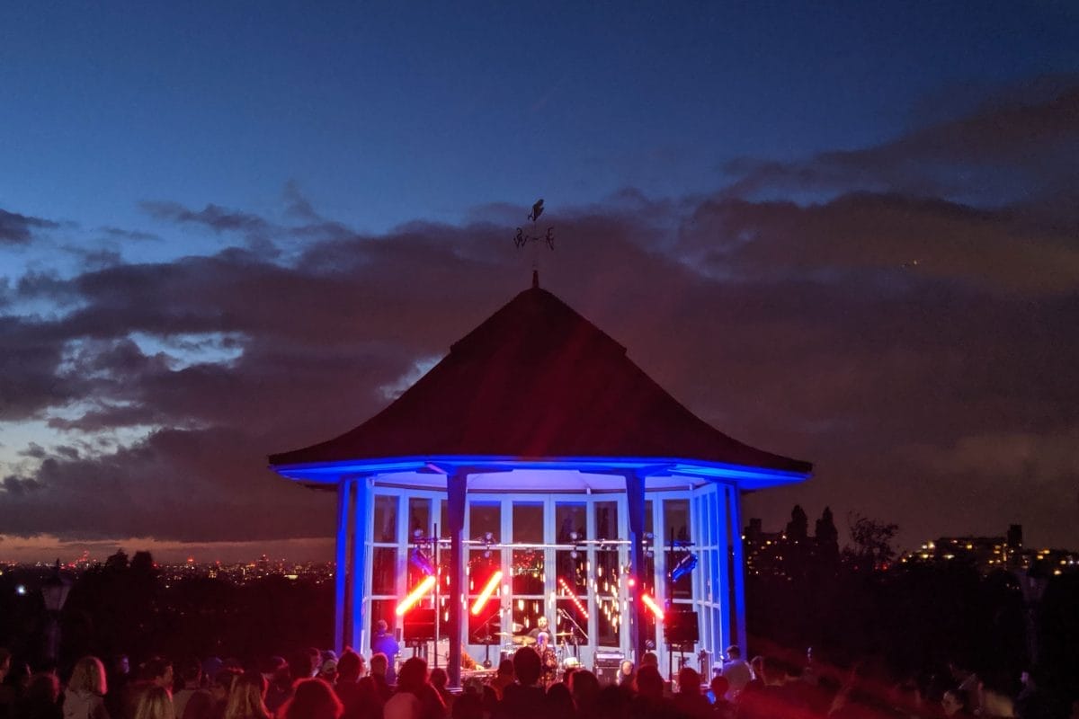 The Bandstand lit up at night for a concert