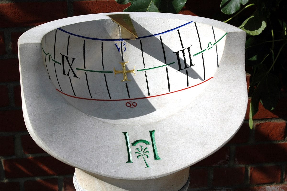 A ceramic sundial close up