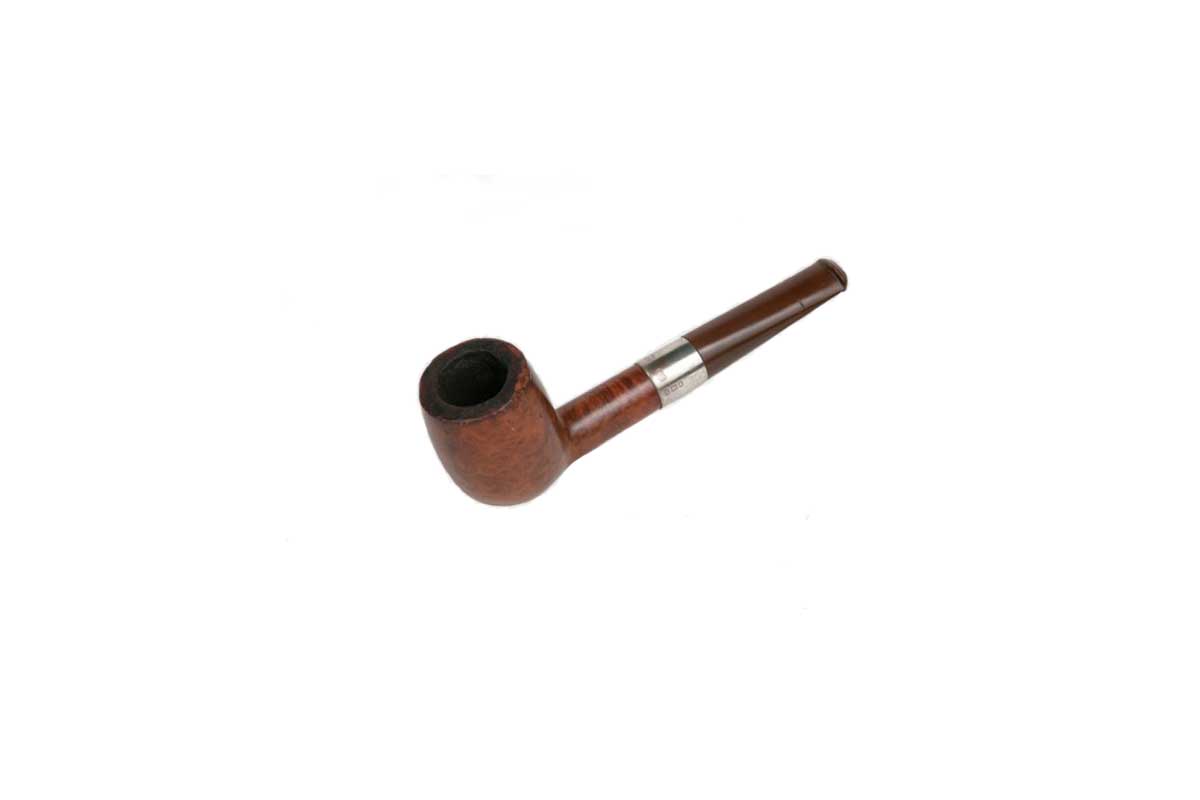 Image shows a tobacco pipe, comprising a fruitwood bowl and stem and Bakelite mouthpiece, joined by a silver band.