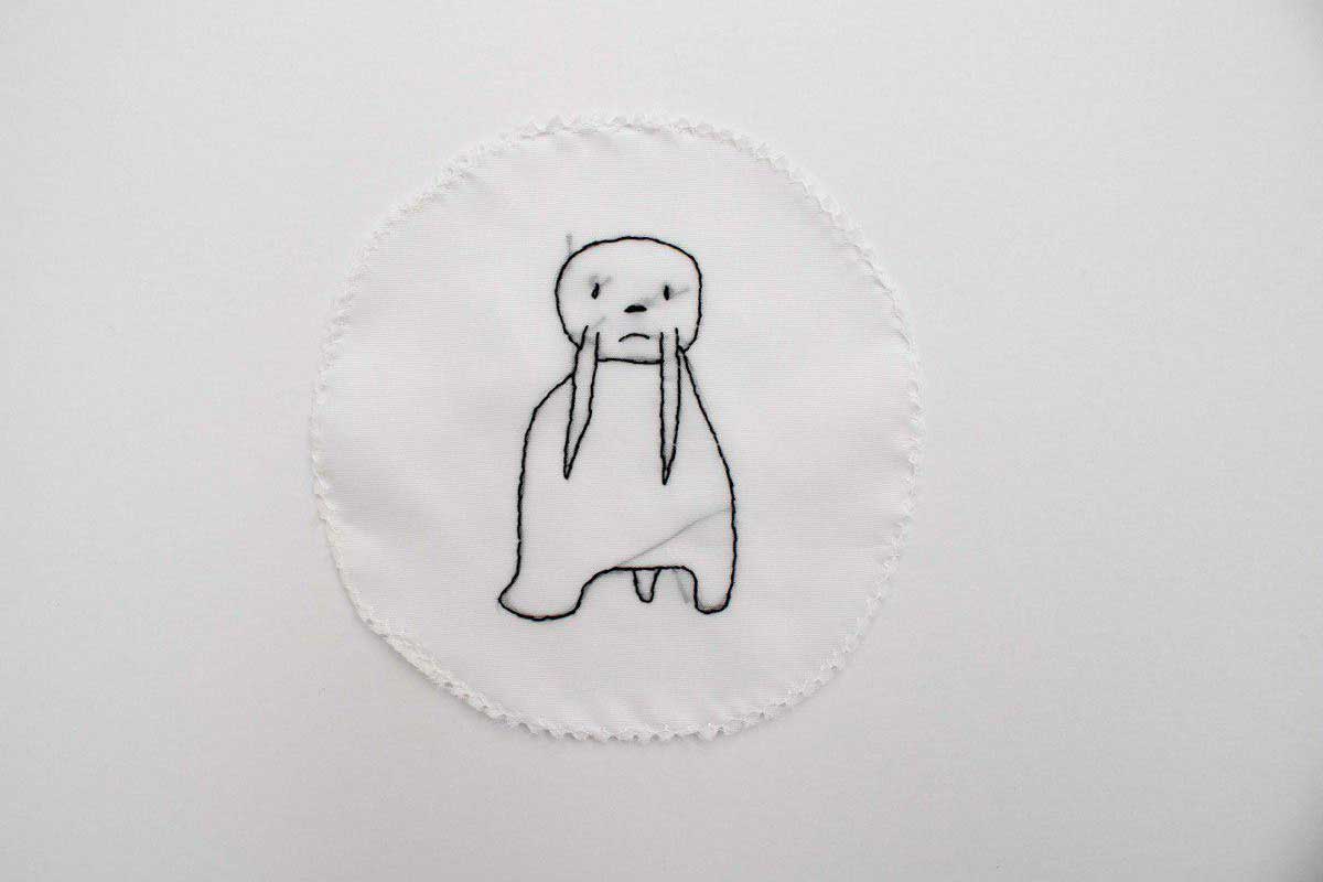 Embroidery of a drawing of a walrus