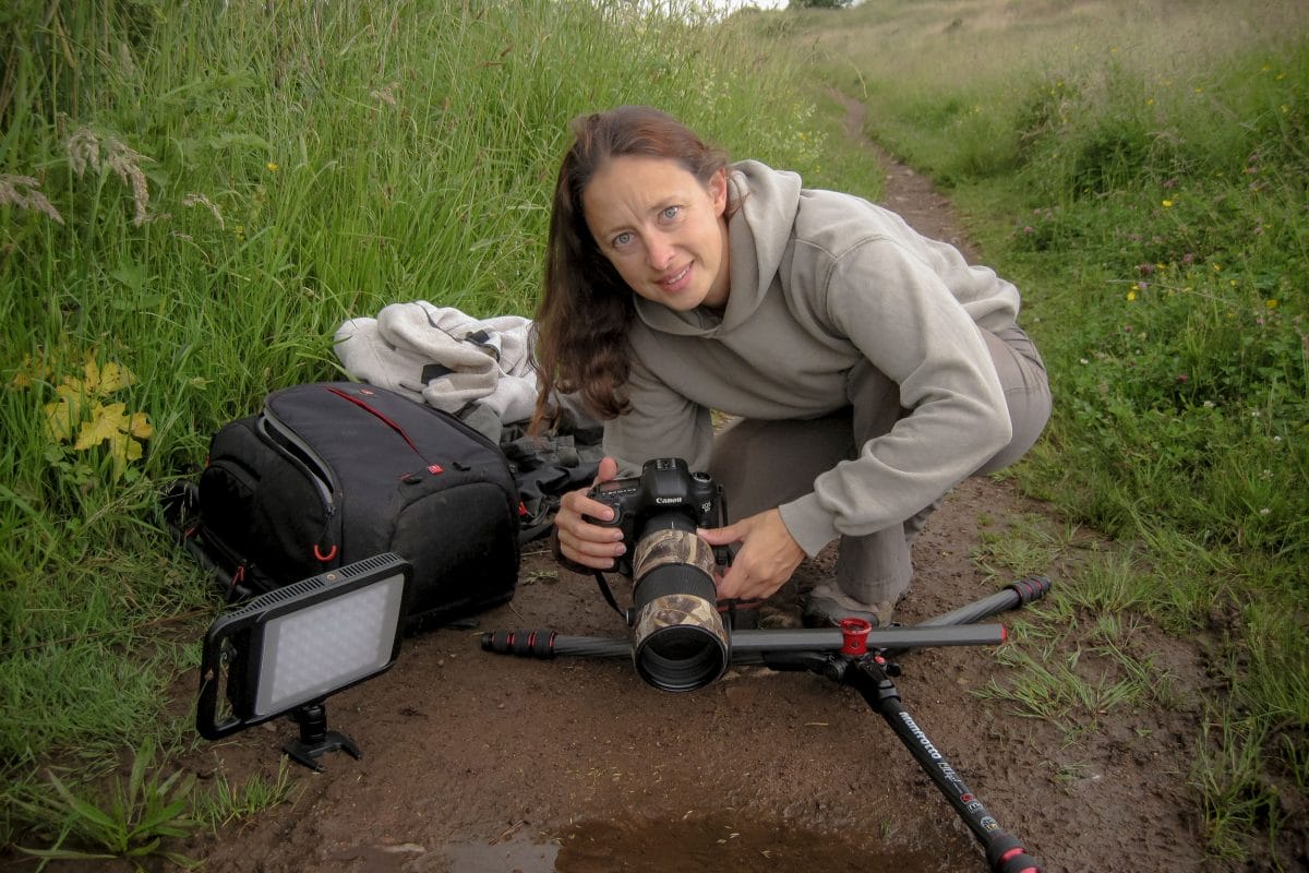 Victoria Hillman with her kit in a field
