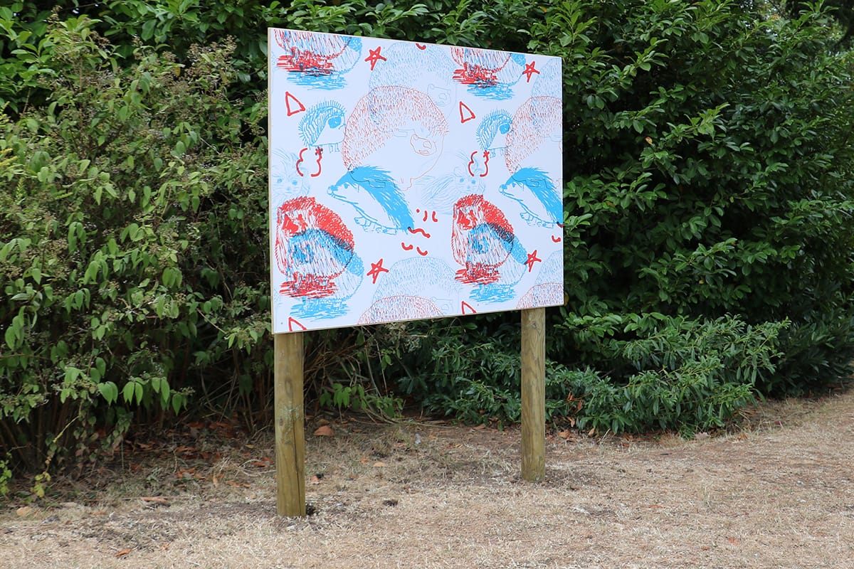 Abstract painting featuring hedgehogs on boards in the gardens