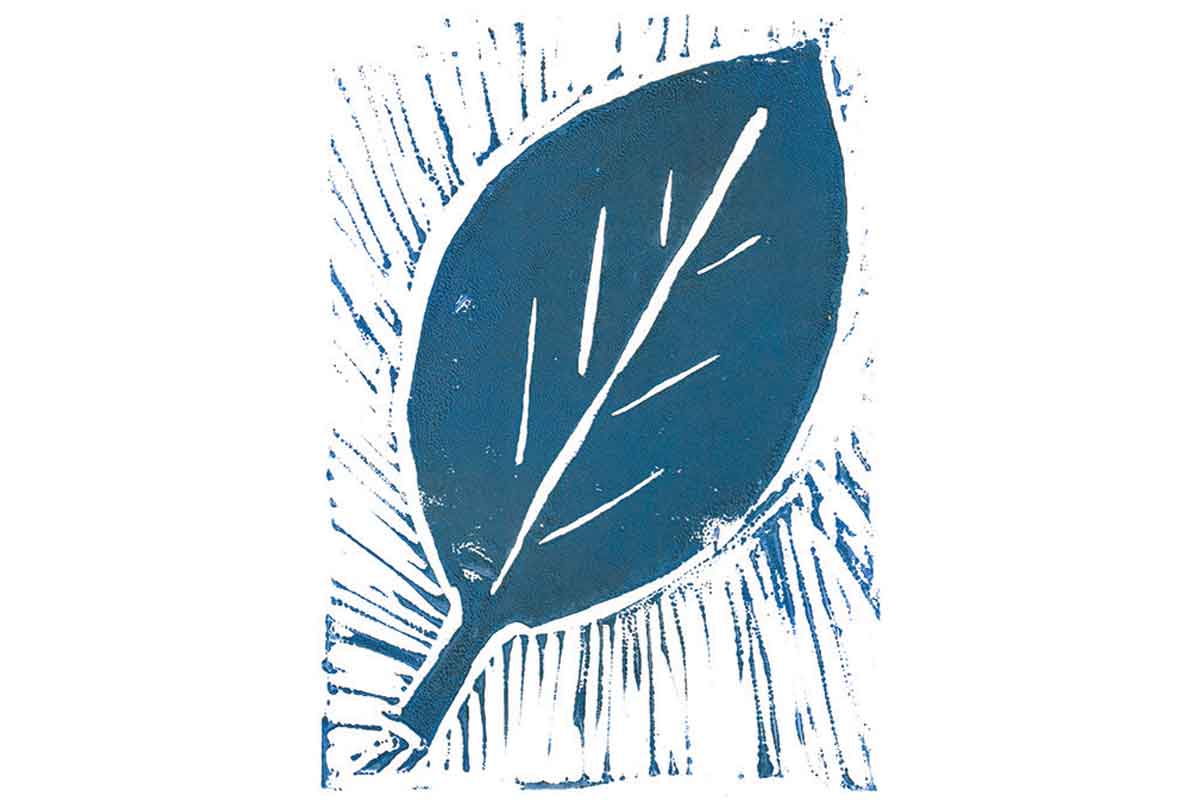 Lino print of a blue leaf