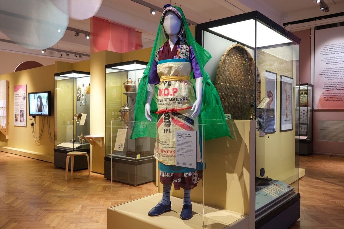 Model with an outfit of a tea plantation worker in the Cha, Chai, Tea, exhibition