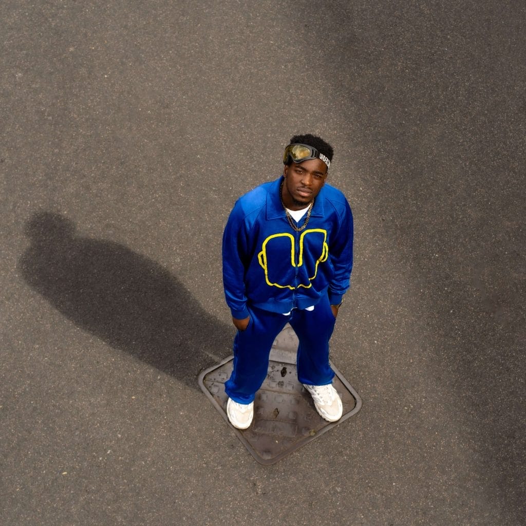 Musician undeniable looks up at the camera