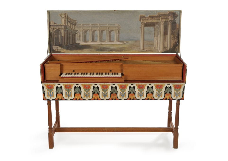 Virginals - a keyboard set in to a case decorated with grand old buildings