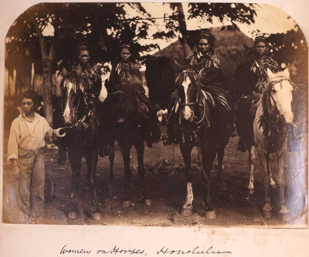 Archive photo of women on horses in Honolulu