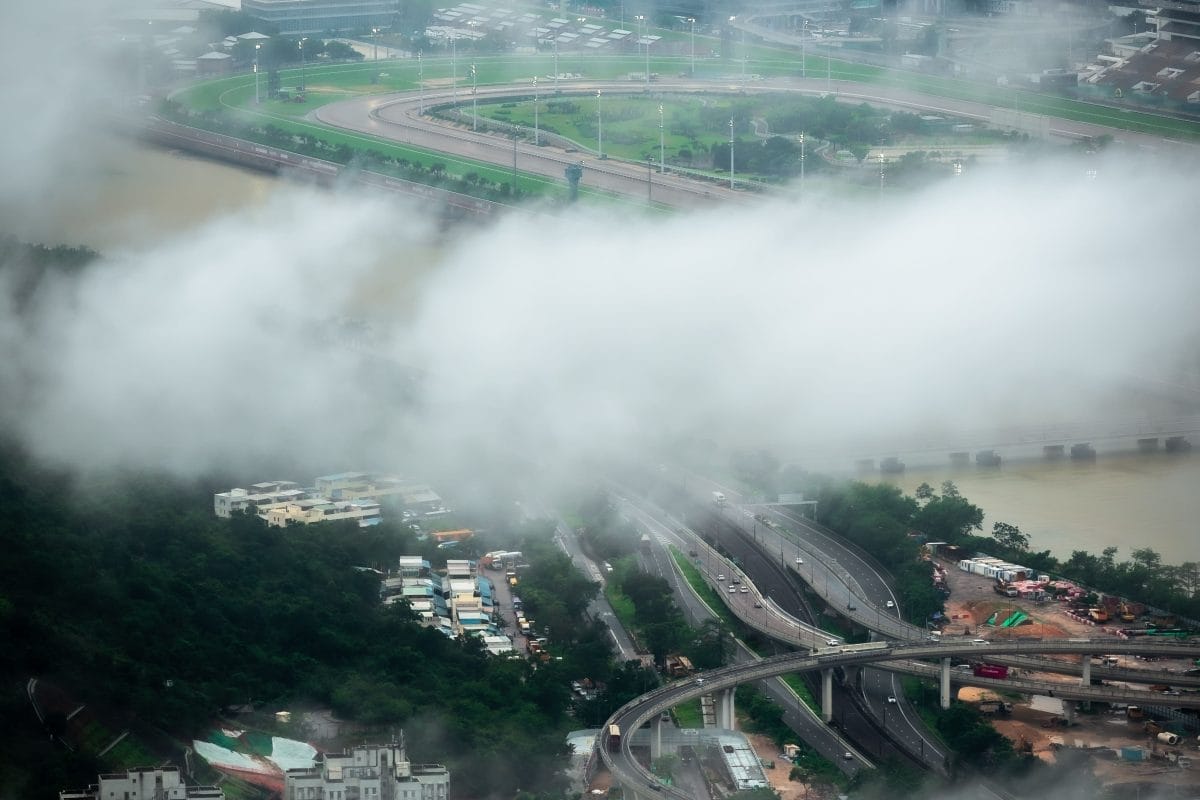 Aerial view of Hong Kong through clouds.