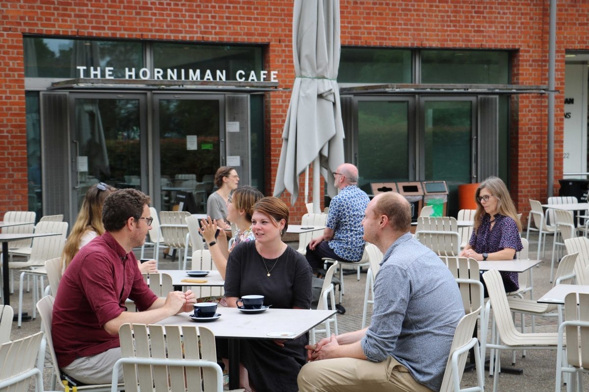 People sat outside on the cafe terrace