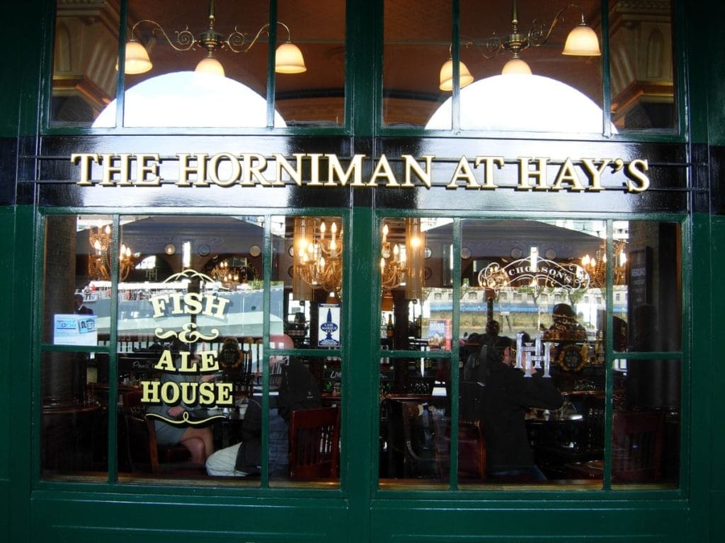 Glass frontage of pub The Horniman at Hays 