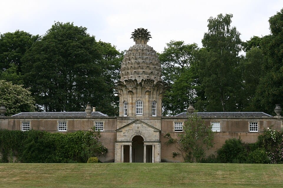 Building with a turret in the shape of a pineapple