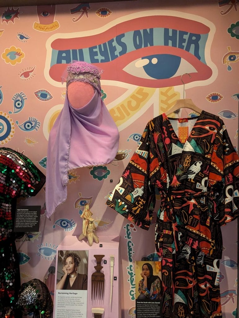 Colourful clothes in display case