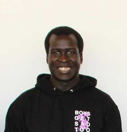 Felix, smiling at the camera