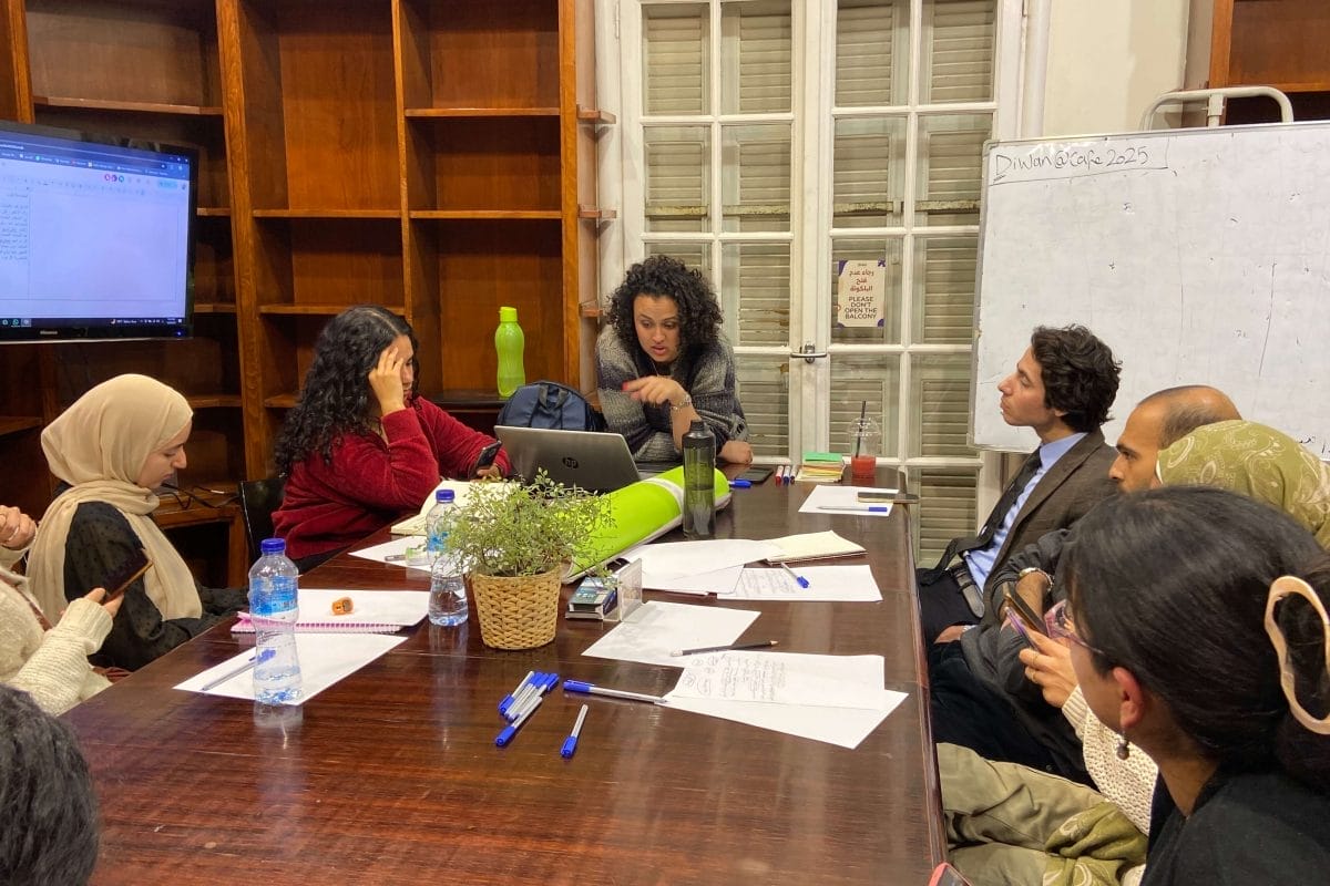 People sat round a table at a workshop